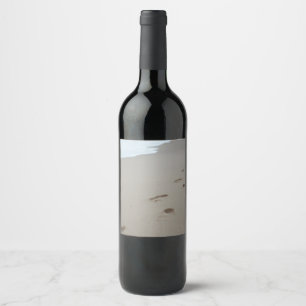Footprints on a Mozambiqan beach Wine Label
