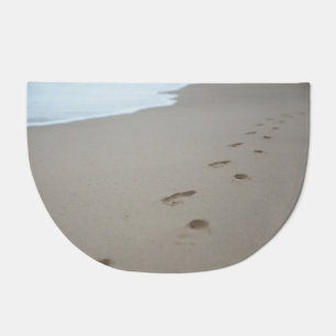 Footprints on a white beach in Mozambique Doormat