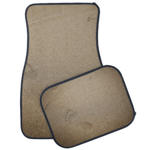 Footprints on sand car floor mat
