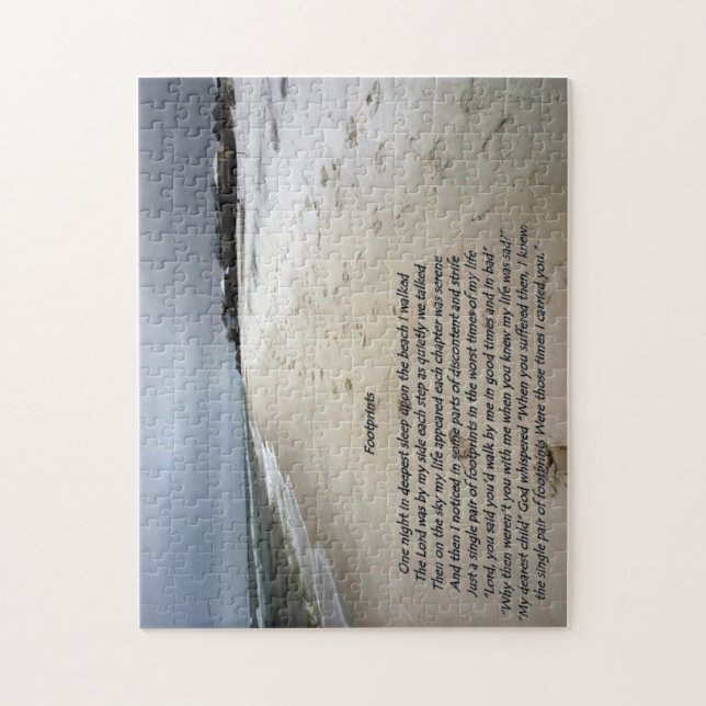 Footprints on the sand created into a puzzle (Vertical)