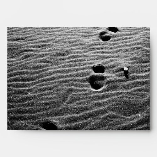 Footprints on the sand envelope