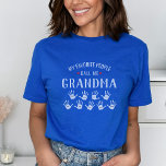 For Grandma with Grandkids Names Personalized T-Shirt<br><div class="desc">Show your love for your favorite people/grandkids with this one-of-a-kind tshirt! Change the recipient's name from grandma to Mimi, Gigi, Nana or whatever your little ones call you - then add their names to the handprints below. There are currently 9 handprints and names but if you have fewer grandchildren, just...</div>