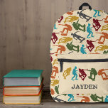 For Skateboarders Skateboarding Graphics Collage Printed Backpack<br><div class="desc">This personalized backpack has a skateboarding theme. It features illustrations of skateboarders in dark red,  orange,  mustard yellow,  green,  turquoise blue and charcoal gray against a faux woodgrain background.</div>