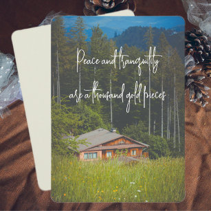 Forest cabin under the mountains  holiday card