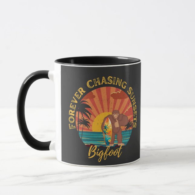 Forever Chasing Sunsets Bigfoot Surfing Black Mug (Left)