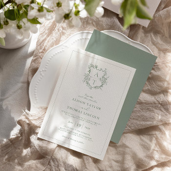 Formal Crest Sage Green Monogram Wedding Invitation by DesignsByElina at Zazzle