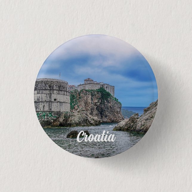 Fortress walls, rocky coast and sea in Croatia Button (Front)