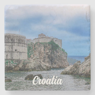 Fortress walls, rocky coast and sea in Croatia Stone Coaster