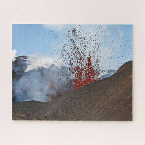 Fountain of red lava erupts from crater of volcano jigsaw puzzle