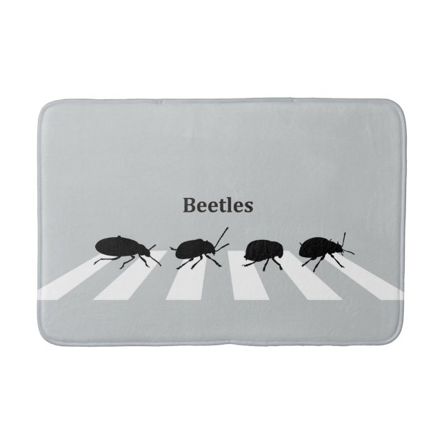 Four beetles walking across a crosswalk in London… Bathroom Mat (Front)