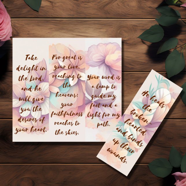 Four Bible Verse Bookmarks (to re-sell?)  Invitation (Image shows four bookmarks with floral theme and bible quotes lying on a wooden table)