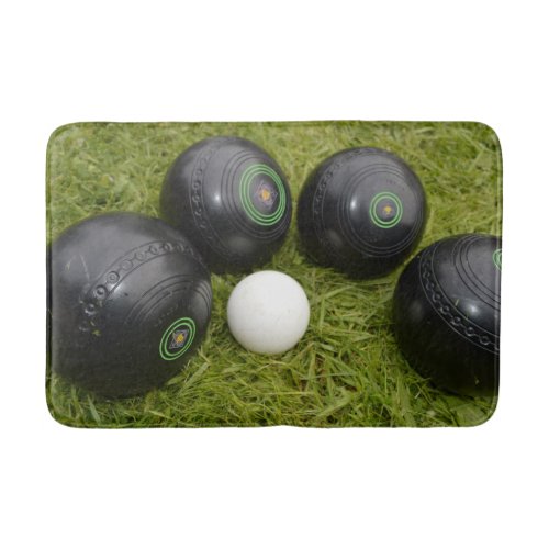 Four Black Lawn Bowls And Jack Bath Mat