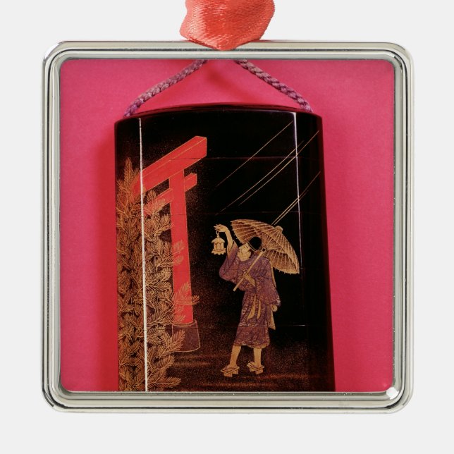 Four case inro depicting a man sheltering metal ornament (Front)