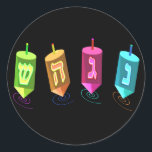Four Dreidels Stickers<br><div class="desc">Four multicolored dreidels showing nun,  gimel,  hei,  and shin. Nes Gadol Hayah Sham. A Chanukah design.</div>
