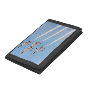 Four F-16 Thunderbirds fly in close formation Trifold Wallet
