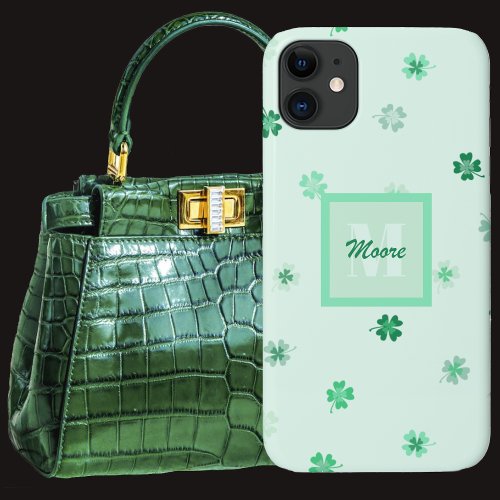 Four Leaf Clovers scattered on light green iPhone 11 Case