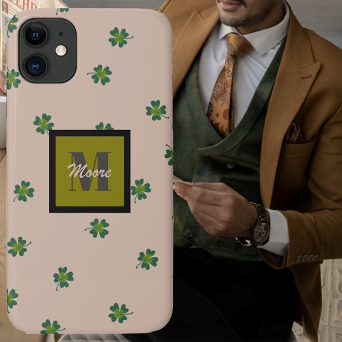 Four Leaf Clovers scattered on pastel brown iPhone 11 Case