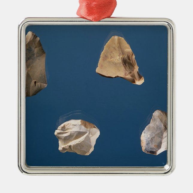 Four tools, 35000-10000 BC Metal Ornament (Front)