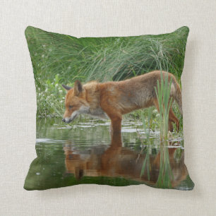 Fox in pond throw pillow