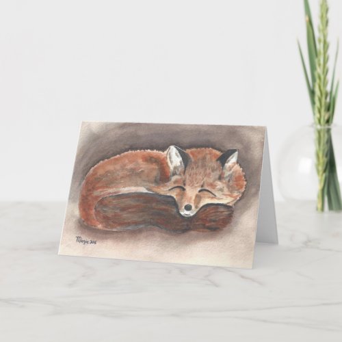 Fox sleeping in snow holiday card