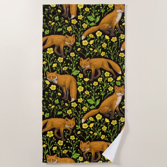 Foxes and buttercups on black beach towel (Front)