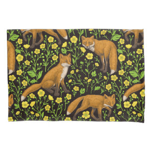 Foxes and buttercups on black pillow case