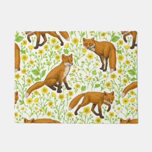 Foxes and buttercups on natural white doormat