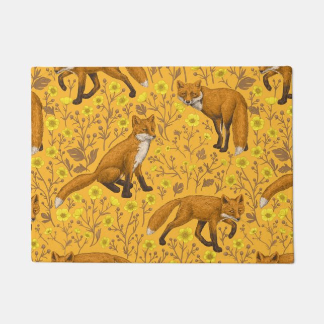 Foxes and buttercups on orange doormat (Front)