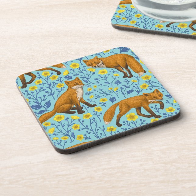 Foxes and buttercups on pool blue beverage coaster (Left Side)
