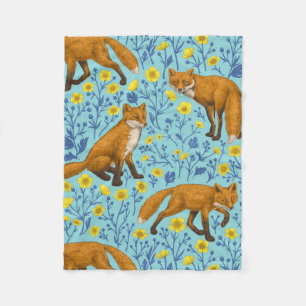 Foxes and buttercups on pool blue fleece blanket