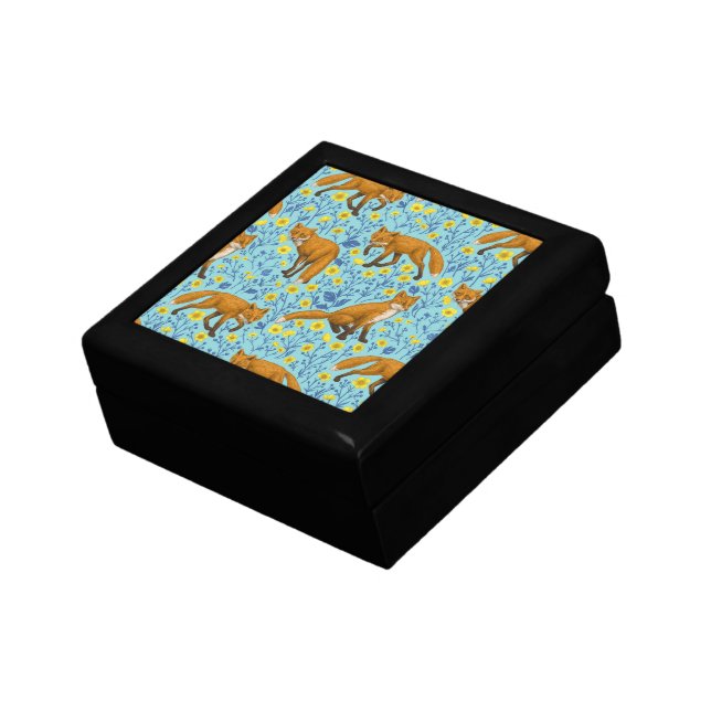 Foxes and buttercups on pool blue gift box (Side)
