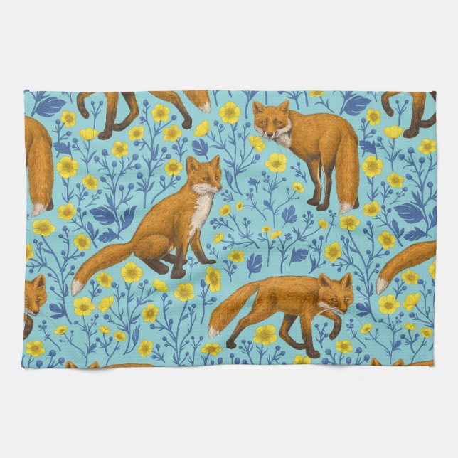 Foxes and buttercups on pool blue kitchen towel (Horizontal)