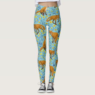 Foxes and buttercups on pool blue leggings