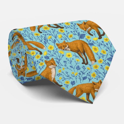 Foxes and buttercups on pool blue neck tie