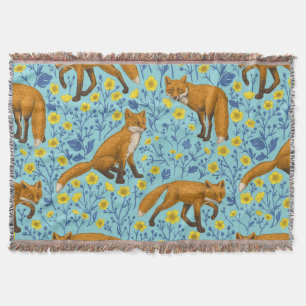 Foxes and buttercups on pool blue throw blanket