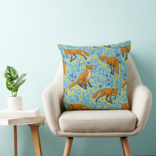 Foxes and buttercups on pool blue throw pillow