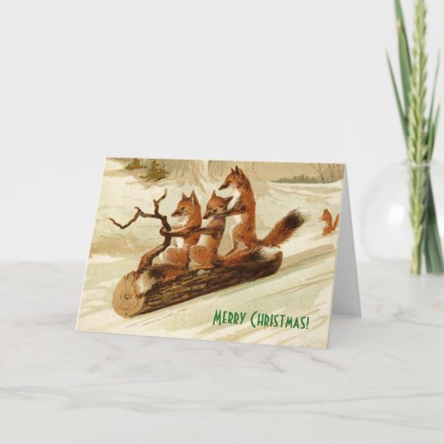 Foxes Sledding on a Log Animal Christmas Card
