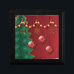Fractal Celebration Christmas Gift Box<br><div class="desc">Layers of fractals make up this stylized Christmas design. A muted red backdrop, a spiky green tree, gold stars and snowflakes hanging from a strand of red and gold beads, and three red balls with a twirling gold design hanging in front.</div>