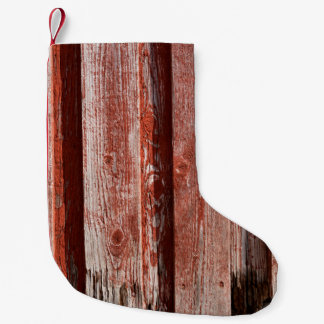 Fragment of an old painted wooden wall. Background Small Christmas Stocking