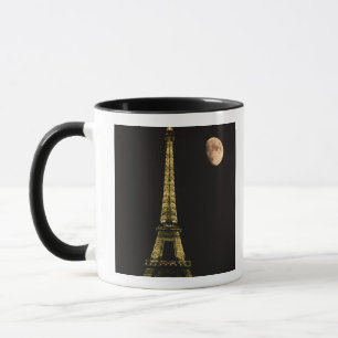 France, Paris. Eiffel Tower at night with Mug
