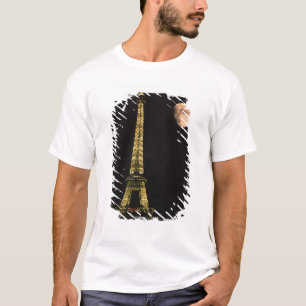 France, Paris. Eiffel Tower at night with T-Shirt
