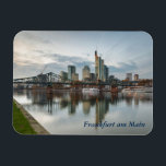 Frankfurt am Main Magnet<br><div class="desc">An evening photo of the River Main with skyline in Frankfurt am Main, Hessen, Germany is featured on this souvenir magnet. The text is customisable or removable. The magnets make an ideal gift, or a personal present to stick on your fridge or filing cabinet. This magnet measures 7.6 cm x...</div>