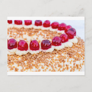 Frankfurt crown cake with cherries on rustic wood postcard