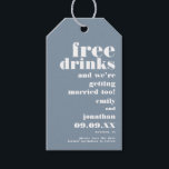 Free Drinks Getting Married Blue Save The Date Gift Tags<br><div class="desc">A funny typographical design to invite your guests to save your wedding date which is fully customisable. The text is all aligned to the right, with bold white typography Free Drinks followed by And We’re Getting Married Too on a dusty blue background. Fully customisable. Easily personalise the words and text...</div>