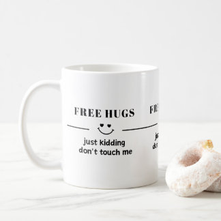 free hugs just kidding don't touch me coffee mug