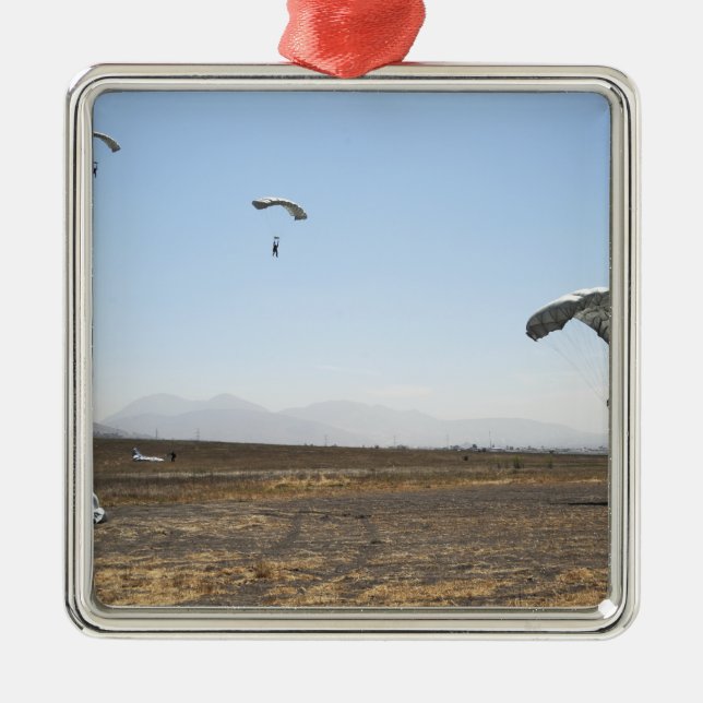 Freefall parachute jumpers metal ornament (Front)