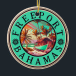 Freeport Bahamas Retro Sunset Travel Souvenir 50s Ceramic Ornament<br><div class="desc">Freeport Bahamas Tropical Retro Sunset design. Indulge in the nostalgia of Freeport with our vintage souvenir, designed specifically for seaside vacationers. Reminiscent of a bygone era, this design encapsulates the tranquility and beauty of the cove, serving as a delightful reminder of your beachside getaway. You can customize and modify this...</div>