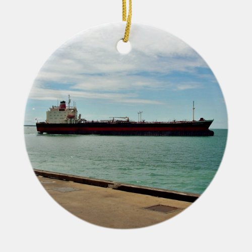 Freighter ship sailing on sea ceramic ornament