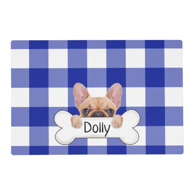 French bulldog with bone on plaid placemat (Front)