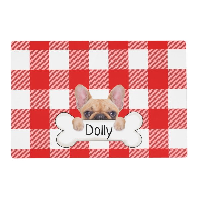 French bulldog with bone on plaid placemat (Front)